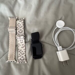 Apple Watch with Black, Beige, and Leopard Bands